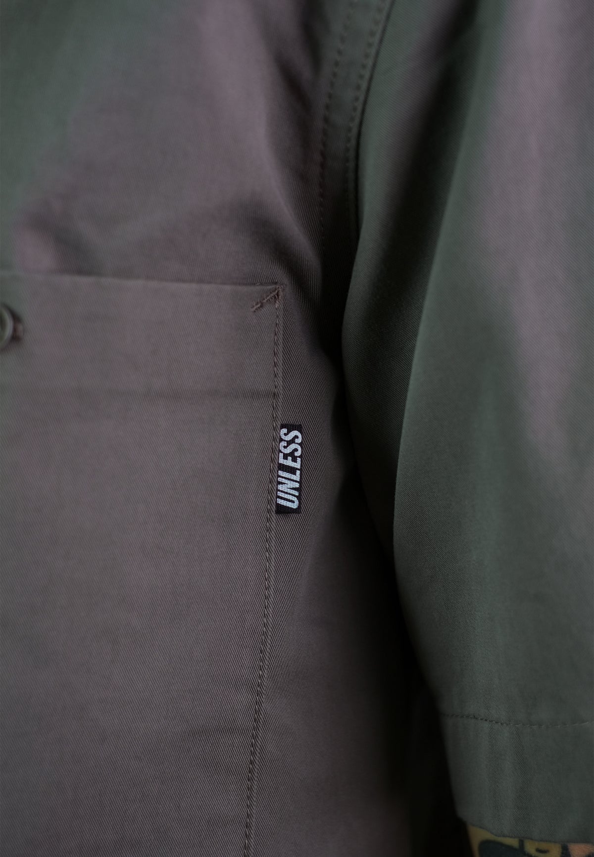 "UNLESS" Embroidered Work Shirt