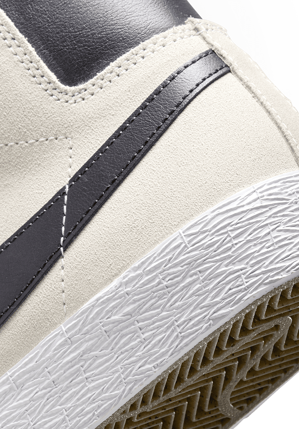 The heel of the Nike skateboarding Blazer Mid in Phantom Grey and Cave Purple.